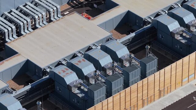 Aerial view of the Google Data Centre in Waltham Cross featuring industrial ventilation systems and modern rooftop infrastructure in Cheshunt, England, United Kingdom.