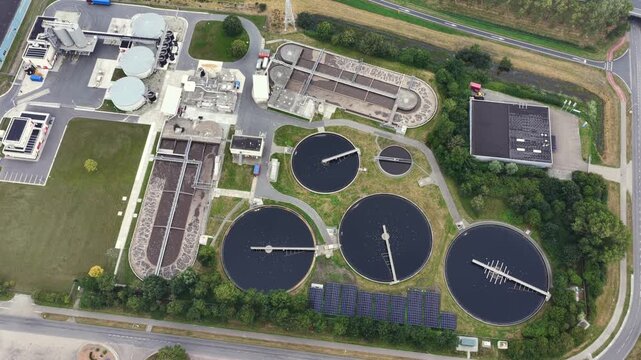 Aerial view of a wastewater treatment plant with solar panels in Drachten