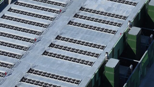 Aerial view of the Google Data Centre featuring rows of cooling fans on the roof in Cheshunt, England, United Kingdom.