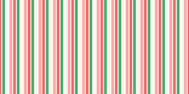 Stripe candy cane seamless pattern with red, pink, green and white vertical stripes. Design winter stripe for Christmas background, wrapping paper, festive card