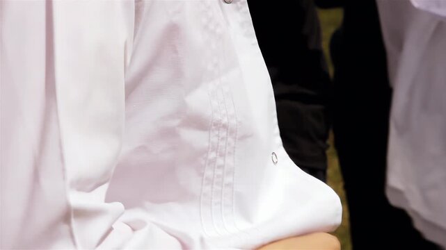 Female Primary School Teachers Putting On White Aprons in Teachers Lounge - 4K