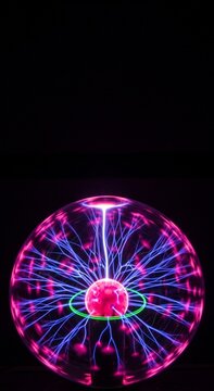 Glowing Plasma Ball with Electric Purple and Blue Filaments ideal for science education, technology concepts, and futuristic background designs. Vertical. Portrait Orientation.