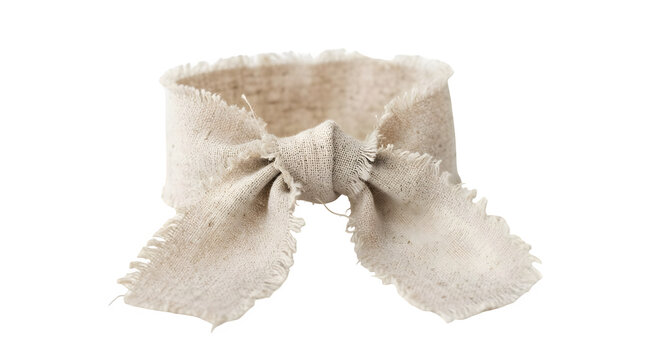 Rustic linen fabric ribbon bow with frayed edges isolated on transparent background