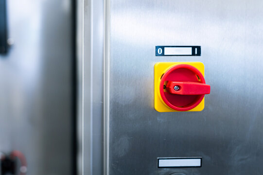 Industrial control panel with red switch