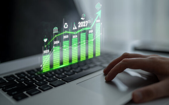 Digital Growth Projection Graph on Laptop Screen with Rising Trend, Future Years and Eco-Friendly Icons Sigmoid