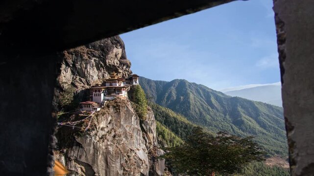 Tiger Nest Monastery Paro Taktsang in Bhutan on a Dramatic Himalayan Cliff Paro Taktsang Tiger Nest Monastery in Bhutan with Himalayan Mountains Famous Paro Taktsang Buddhist Monastery in the Himalaya