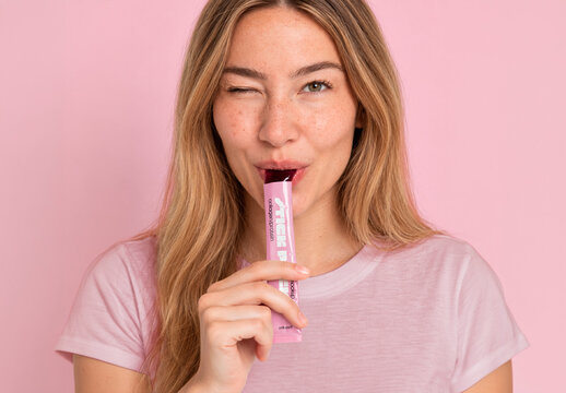 Woman Eating Jelly Stick Pack Mockup