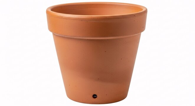 Empty terracotta flower pot with drainage hole on white background