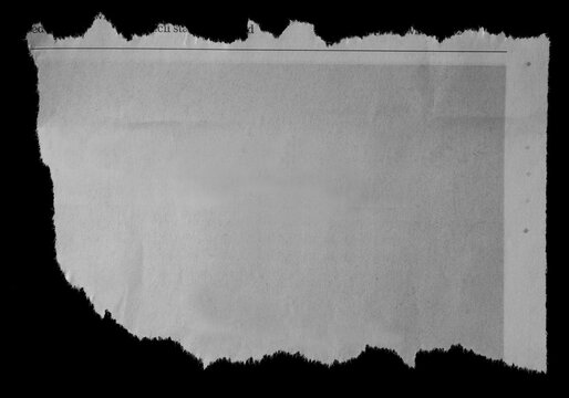 Torn paper on black