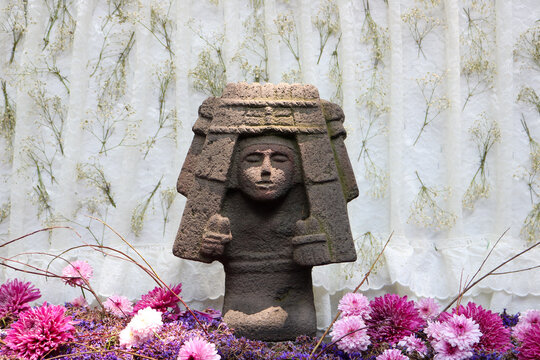Pre-Hispanic Style Female Sculpture with Flowers