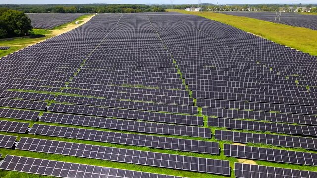 Solar panels extend across a large Virginia installation in aerial 4K video.
