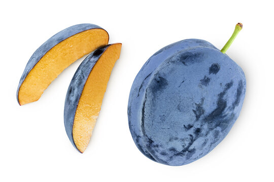 fresh blue plum with slices isolated on white background. Top view. Flat lay