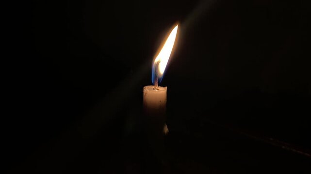 candle on black background