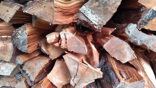 Detailed macro shot of stacked split firewood logs