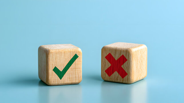 Wooden blocks with green check mark and red cross symbols on blue background for decision making concept, choice option poll survey correct incorrect right wrong true false compare success fail busine