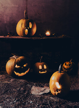 spooky Halloween background with jack'o'lanterns in the night


