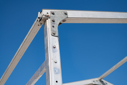 Architectural detail. Installation of metal structure. Metal construction backdrop. Structural design engineering. Structure engineering at building site. Framework construction architecture