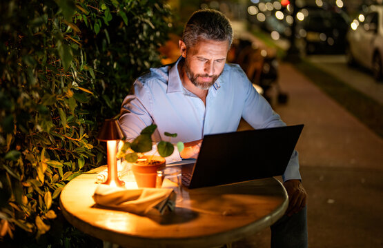 Successful business man using laptop. Businessman working on digital data management. Professional marketing manager. Business success. CEO manager outdoor. Businessman CEO in suit
