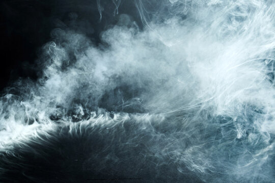 Abstract smoke flowing mist vapor background texture