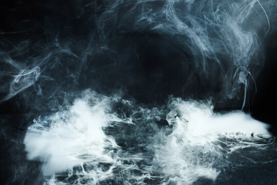 Abstract smoke fog vapor effect on black background