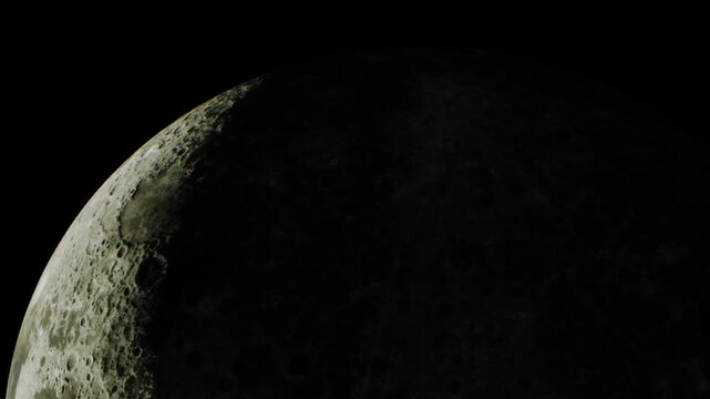 The moon is visible in the night sky showing features of its surface. Shadows are present highlighting craters and textures. The dark background contrasts with the moons light.