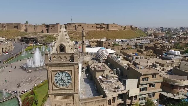 Aerial view of the Shar Park clock tower, fountains and Qaysari Bazaar in Erbil, Kurdistan