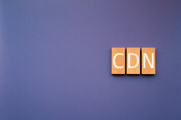 CDN text on wood blocks symbolizing content delivery network architecture — ideal eye-catcher for IT infrastructure blog posts © hogehoge511