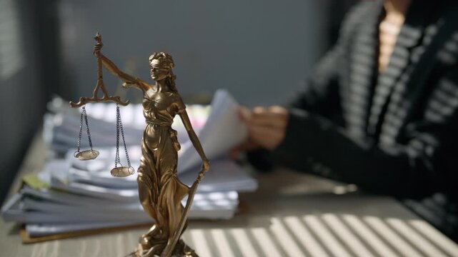 Close-up Lady Justice statue representing court judgment, rule of law, judicial independence, legal authority, ethics, civil rights, dispute resolution, and justice administration.