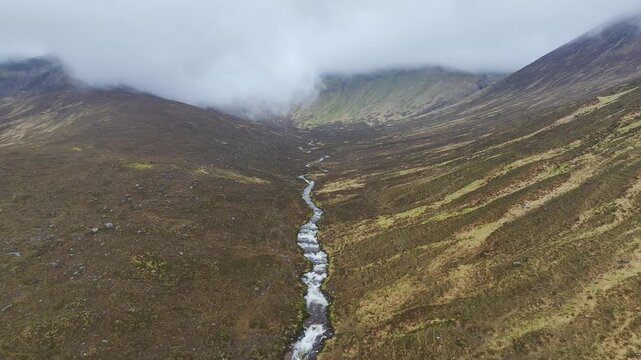 Eas a' Bhradain Waterfall from a drone, Blackhills Waterfall, Loch Ainort, A87 road, Isle of Skye, Scotland, England, United Kingdom