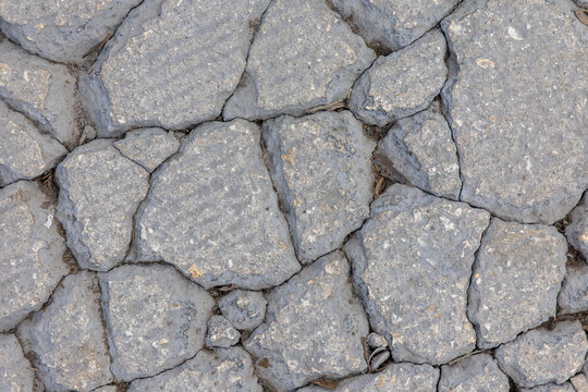 Cracked Gray Stone Cobblestone Pavement &ndash; Rough Rock Ground Texture Background