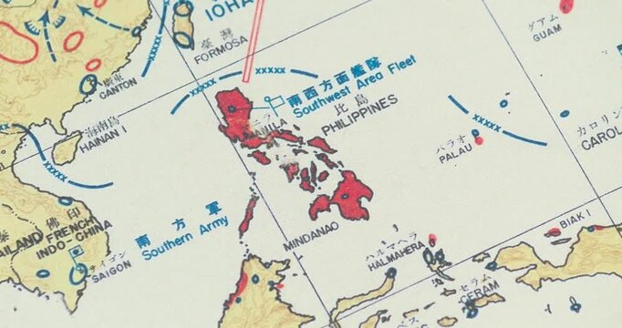 zoom out view of a vintage map with the usa army movements into philippines map of WWII