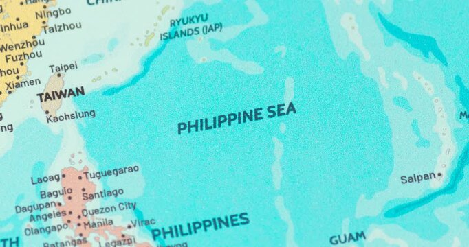 Zoom out view of the philippine sea region on a modern political world map