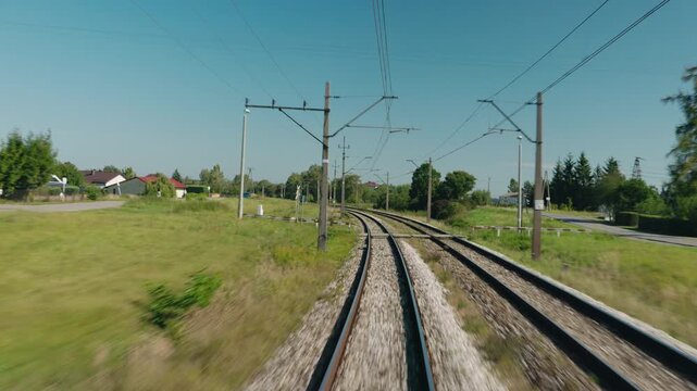 View from a Moving Train on Curving Electrified Railway Tracks