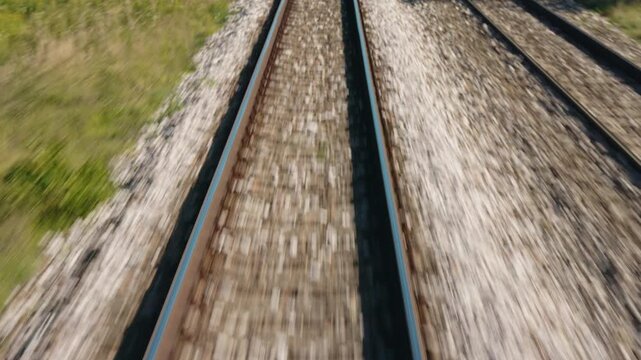 Forward Motion Along Parallel Railway Tracks