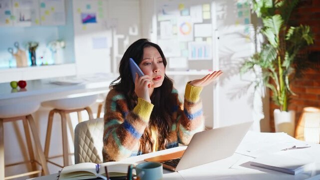 Female entrepreneur stressful phone call. Frustrated woman headache home office.