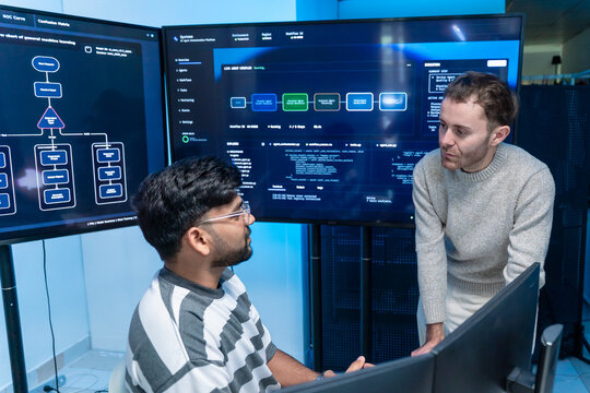 Software engineering use computer working development office are assisting algorithm systems or verifying code. Programmer teamwork using artificial intelligence on laptop analysis or writing coding