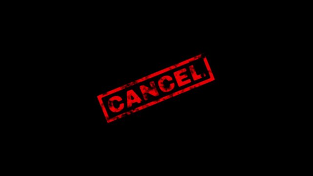 Red rubber stamp with the word cancel on a black background, grunge texture effect, conceptual design for cancellation or rejection