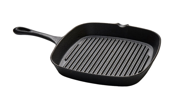 Black cast iron grill pan with raised ridges and long handle, isolated on transparent background with clipping path, suitable for cooking, grilling, searing and kitchen product design.
