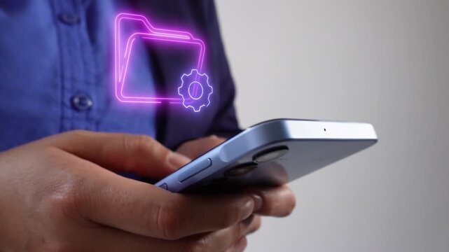 Digital resource setup. Professional businesswoman checking her mobile phone, featuring a virtual icon of a folder and a gear.