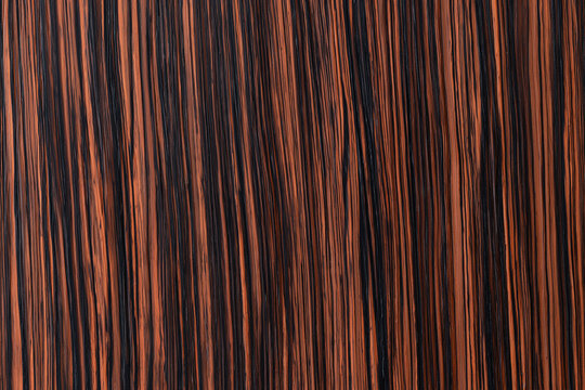 Dark ebony wooden texture background with vertical lines pattern