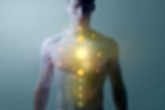 Male torso front view with illuminated chakra centers and energy line for spiritual healing poster and wellness design