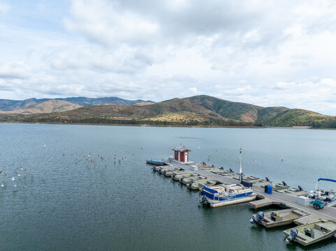 Aerial view of Otay Lakes County Park in Chula Vista, California, a scenic view of a mountain range, the lake. High quality photo