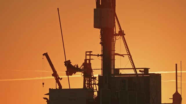 Drill pipe is withdrawn from a deep drilling rig near R&oslash;dbyhavn during exploration well operations for onshore geological CO2 storage, CCS site characterization and subsurface investigation.