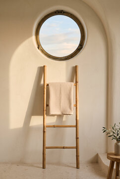 Minimalist scandinavian interior with wooden ladder and porthole window