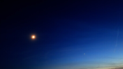 Moon, planet conjunction and stars in blue hour time. © astrosystem