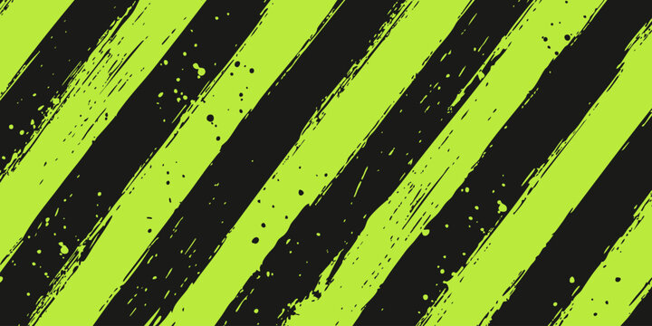 Bright neon green and black diagonal grungy stripes banner background with paint splashes and brush stroke texture