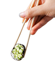Hand holding sushi with chopsticks © vansh