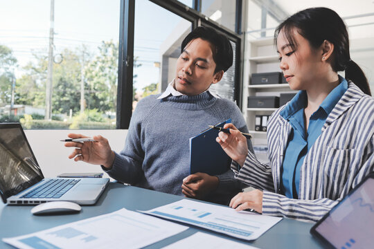 Business professional analyzing financial data on digital tablet dashboard with calculator and laptop, representing accounting software, ERP system integration, performance monitoring.