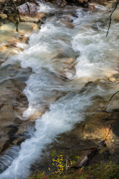 Canada, Alberta, Banff National Park.   Surging water of the Johnston Creek in the Johnston Canyon, a popular hike for park visitors.