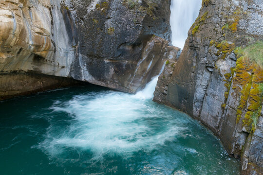 Canada, Alberta, Banff National Park.   Surging water of the Johnston Creek in the Johnston Canyon, a popular hike for park visitors.